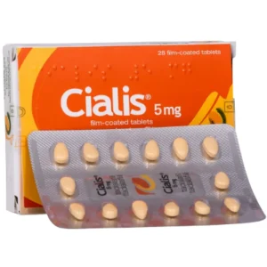 A blister pack of Cialis 5 mg film-coated tablets placed in front of its orange and yellow packaging box.